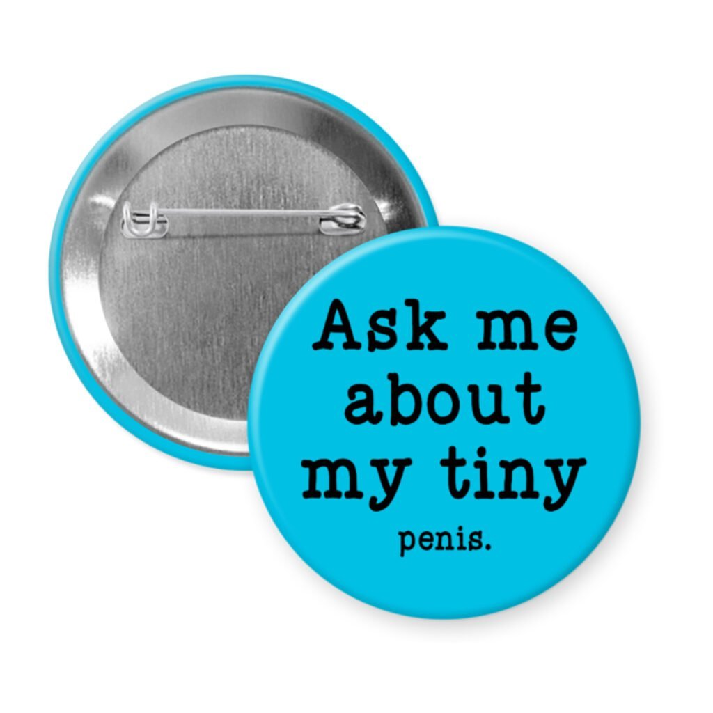 Blue pinback button with text 'Ask me about my tiny penis' printed in black.