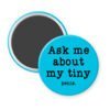 Blue magnet with text 'Ask me about my tiny penis' printed in black.
