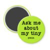 Green magnet with text 'Ask me about my tiny penis' printed in black.