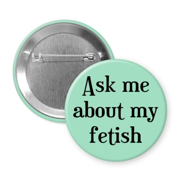 Mint button with the text 'Ask me about my fetish' printed in black.