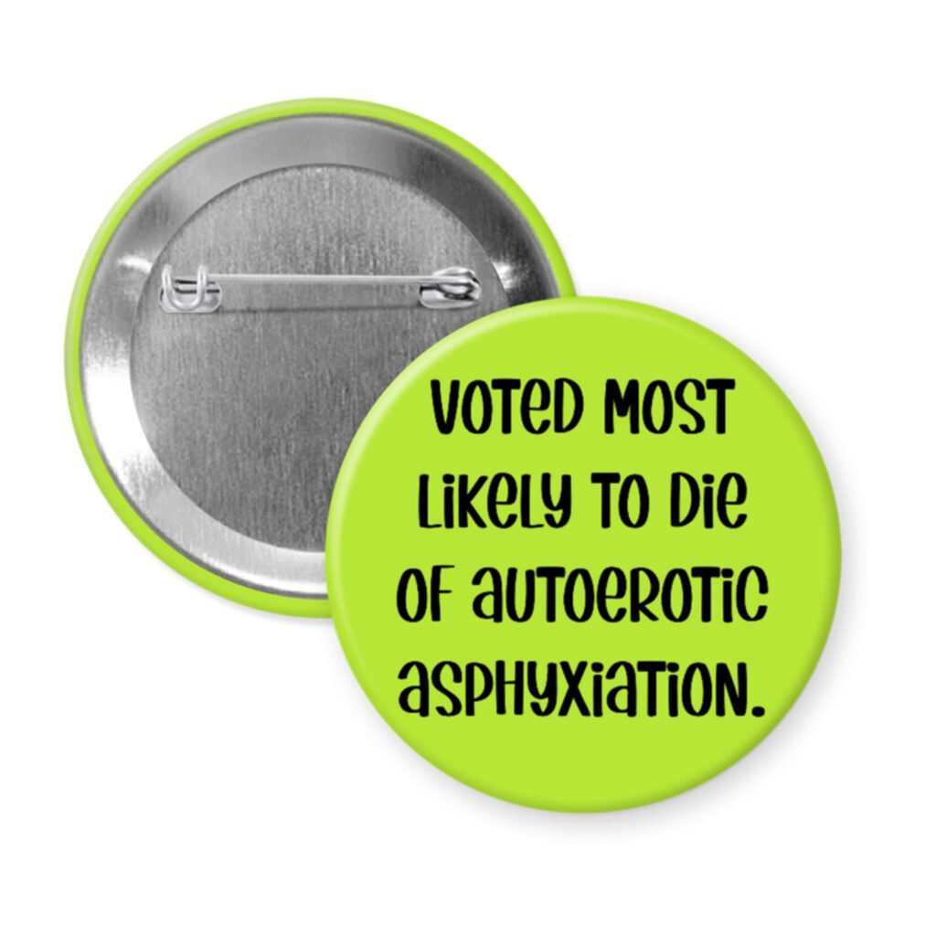 Green pinback button with the text 'Voted most likely to die of autoerotic asphyxiation.' printed in black.