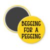 Yellow magnet with the text 'Begging for a pegging' printed in black.
