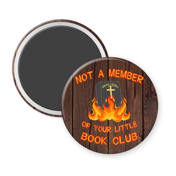 Fridge magnet with a Bible on fire and text 'Not a member of your little book club' on a wood print background