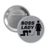 Grey pinback button with a graphic of a collared and leashed man on hands and knees, a woman figure holding the leash with the text 'BOSS LADY' printed in black.