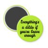 Green magnet with the text 'Everything's a dildo if you're brave enough' printed in black.