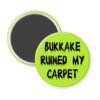 Green magnet with the text 'Bukkake ruined my carpet' in black drippy font.