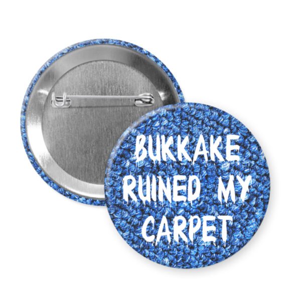 Blue carpet print pinback button that says Bukkake ruined my carpet.