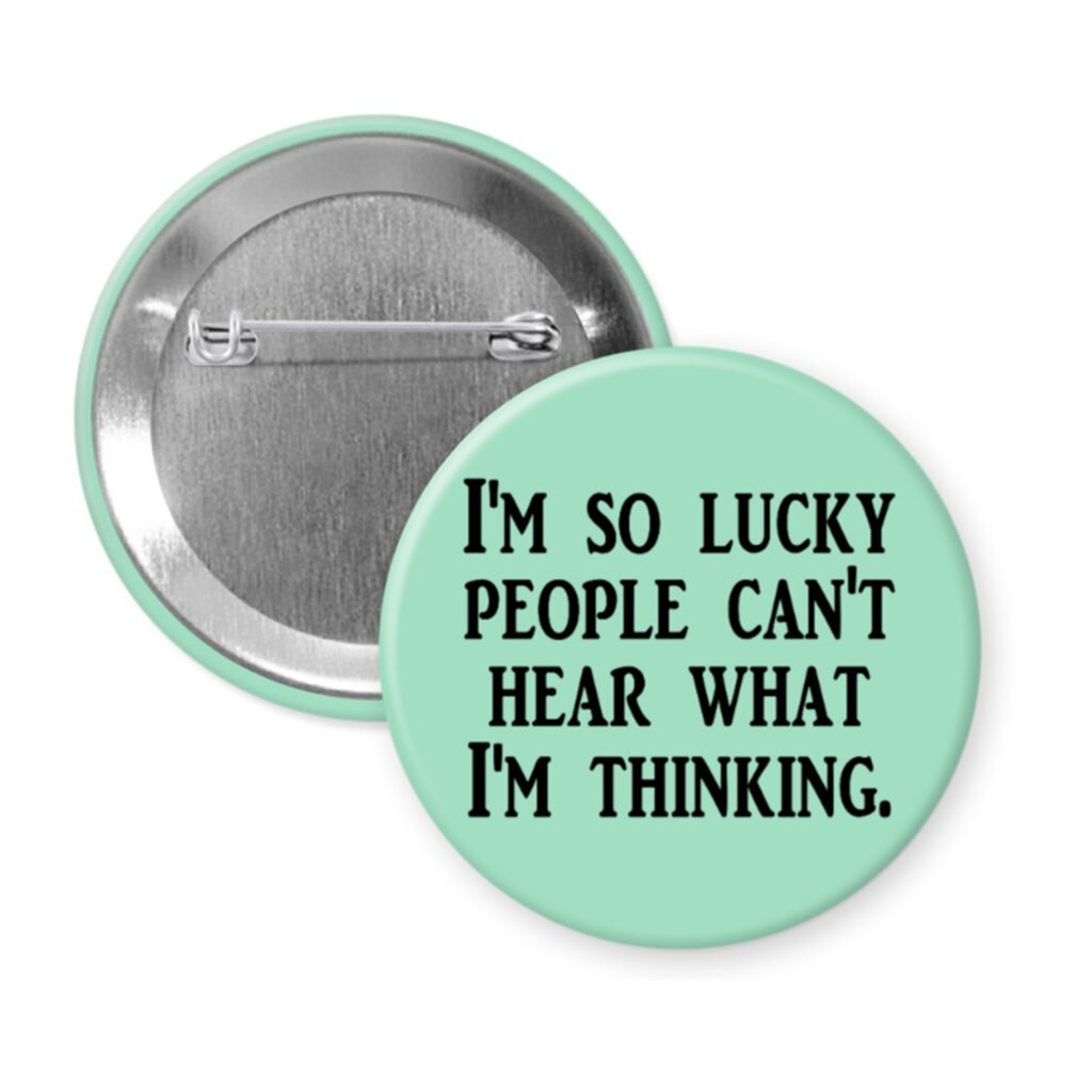 Green pinback button with the text 'I'm so lucky people can't hear what I'm thinking.' printed in black.