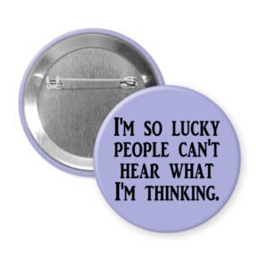 Purple pinback button with the text 'I'm so lucky people can't hear what I'm thinking.' printed in black.