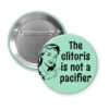 Mint button with vintage woman graphic and the words "The clitoris is not a pacifier".