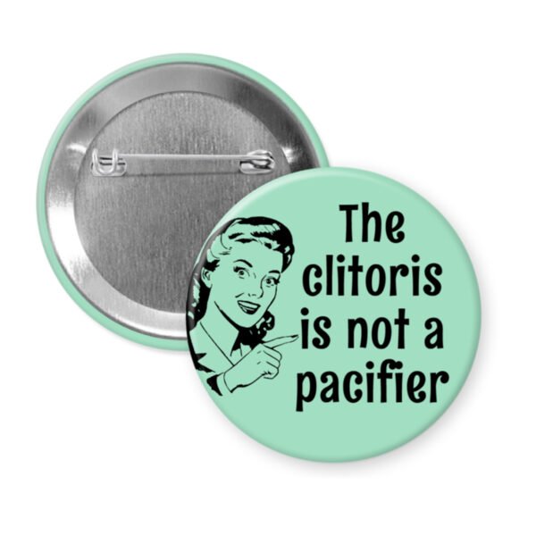 Mint button with vintage woman graphic and the words "The clitoris is not a pacifier".