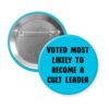 Blue pinback button with the text 'Voted most likely to become a cult leader' printed in black.