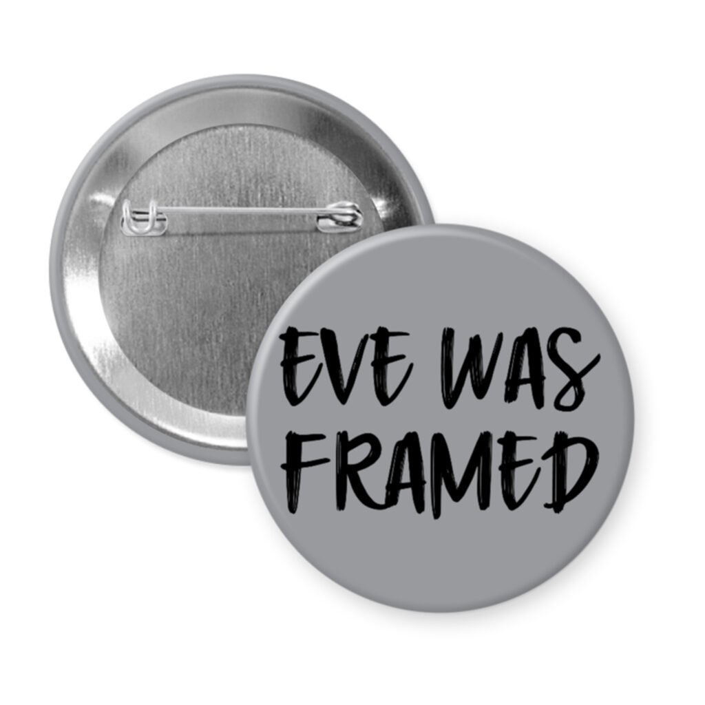 Grey pinback button with the text 'Eve was framed' printed in black.