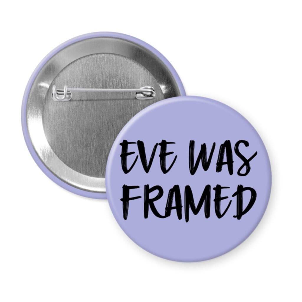 Purple pinback button with the text 'Eve was framed' printed in black.