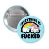 Pin button with unicorn and rainbow design on a light blue background