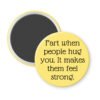 Yellow magnet with the text 'Fart when people hug you. It makes them feel strong.' printed in black.