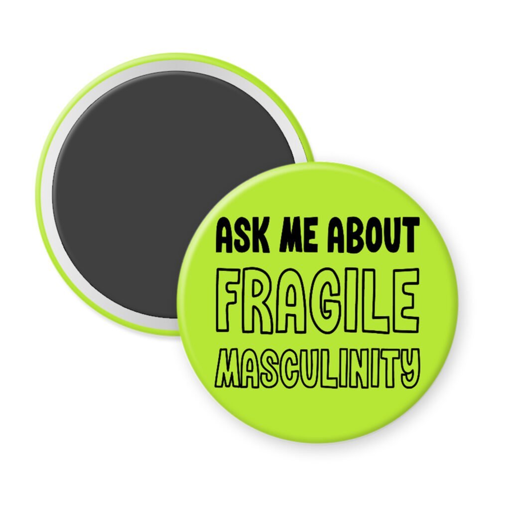 Green magnet with the text 'Ask me about fragile masculinity' printed in black.