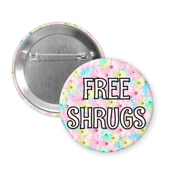 Button badge with 'FREE SHRUGS' text on a floral background