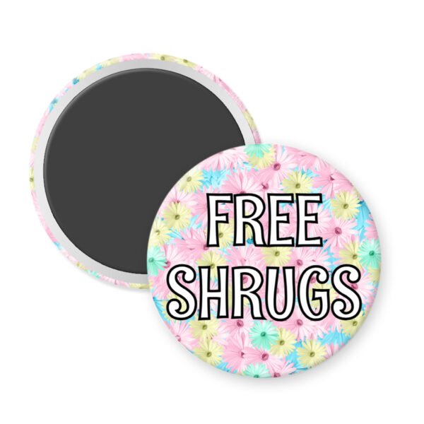 Round magnet with floral design and 'FREE SHRUGS' text on a white background.