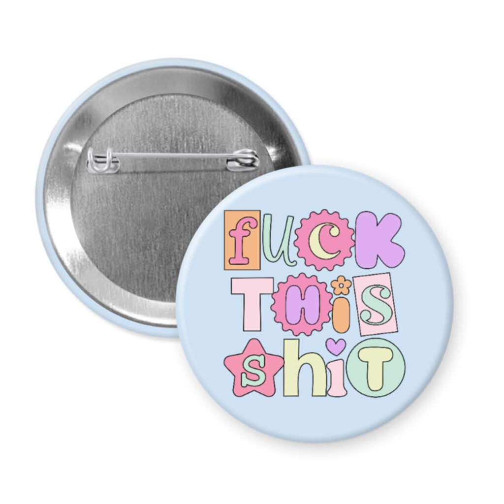 Fuck this shit button badge with colorful text on a light blue background