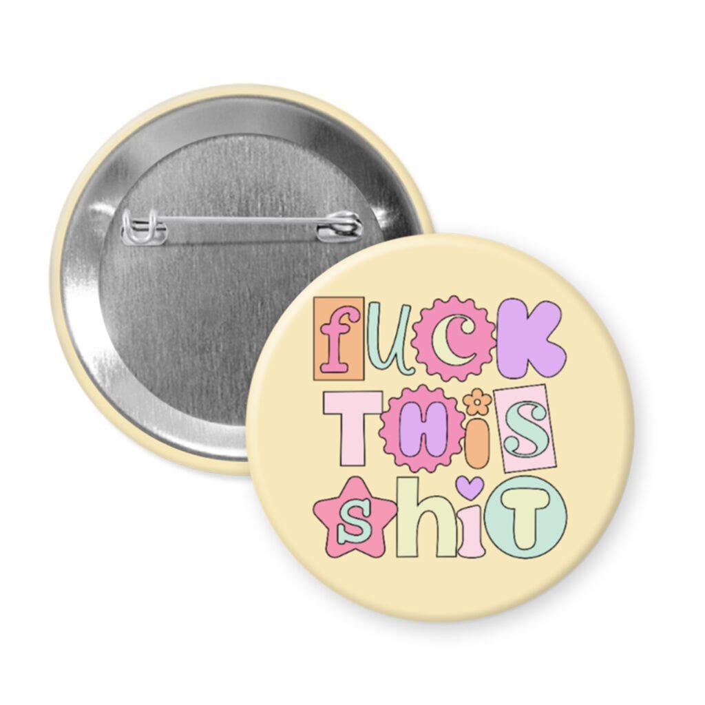 Fuck this shit button badge with colorful text on a light yellow background