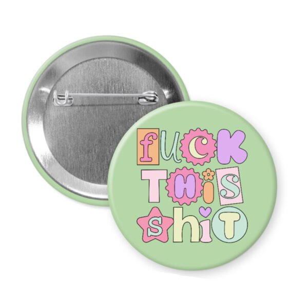 Fuck this shit button badge with colorful text on a light green background