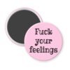 Pink magnet with the text 'Fuck your feelings' printed in black.