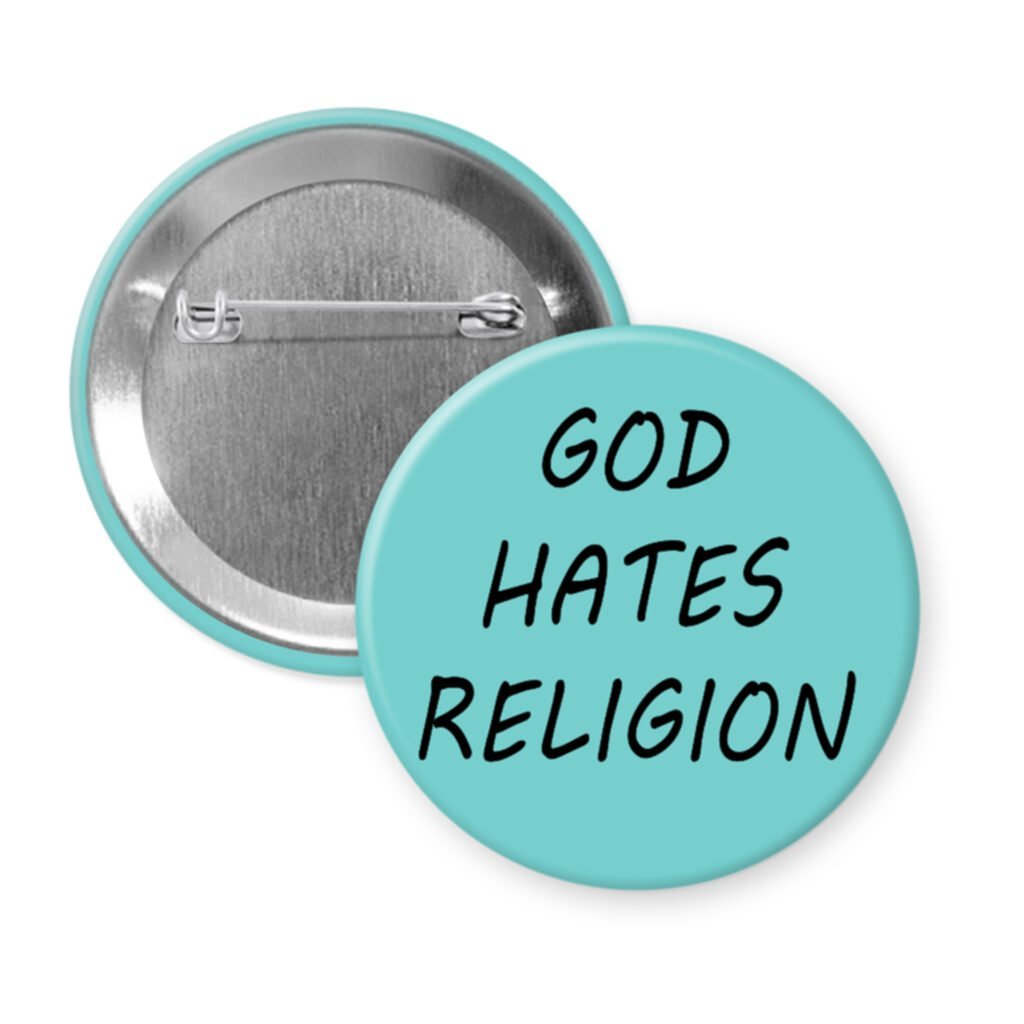 Blue pinback button with the text 'God hates religion' printed in black.