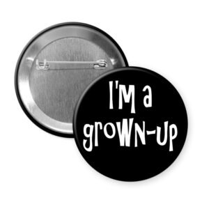 Black pinback button that says "I'm a grown-up".