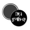 Black magnet that says "I'm a grown-up".