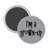 Grey magnet with the text 'I'm a grown-up' printed in black.
