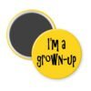 Yellow magnet with the text 'I'm a grown-up' printed in black.