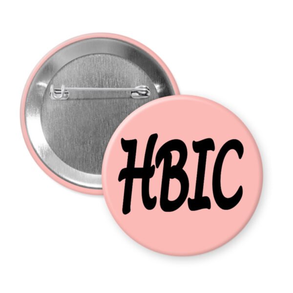 Peach button with 'HBIC' text on a white background