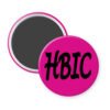 Pink magnet with 'HBIC' text on a white background.