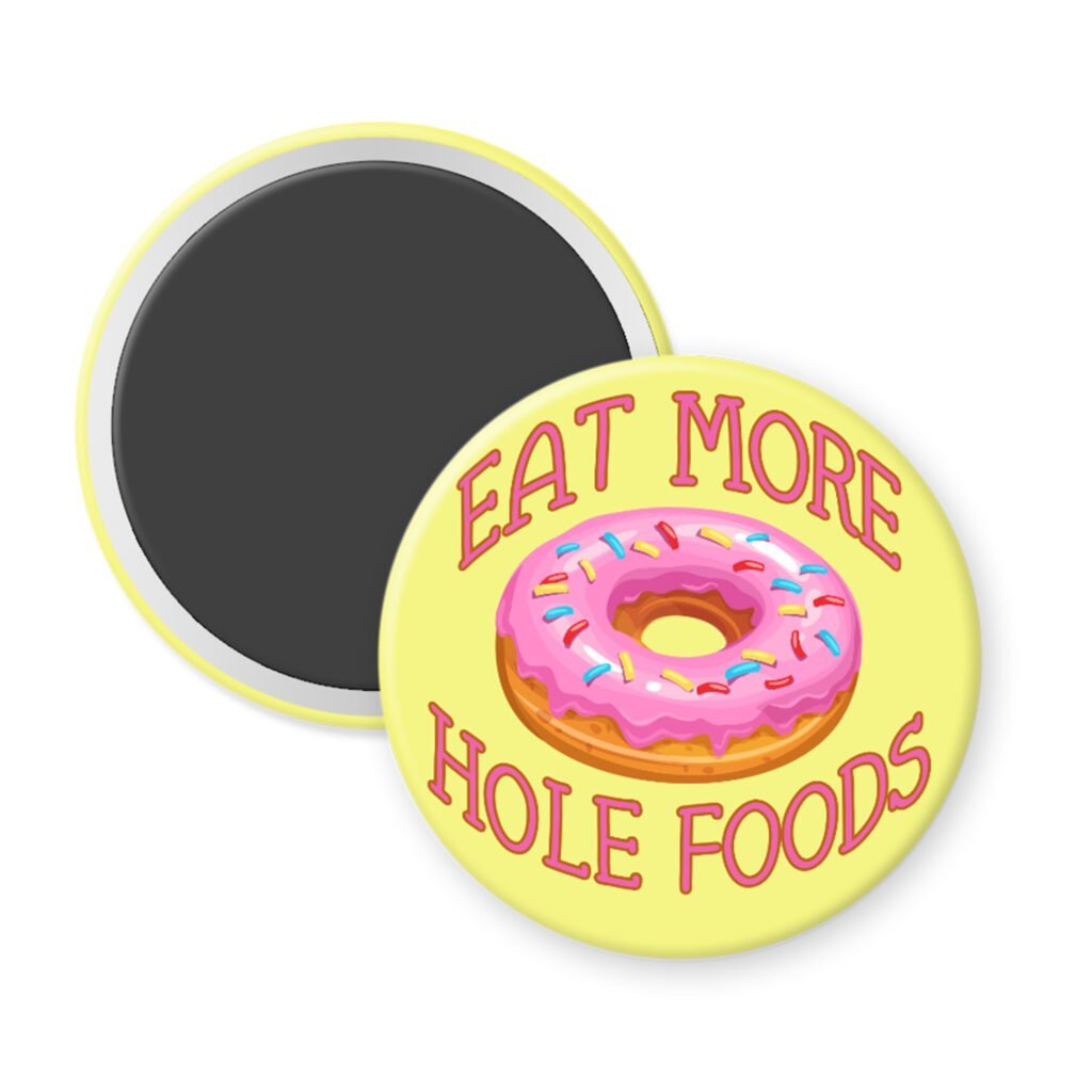 Funny donut pun magnet with image of a donut with pink icing and sprinkles with the words Eat more hole foods.