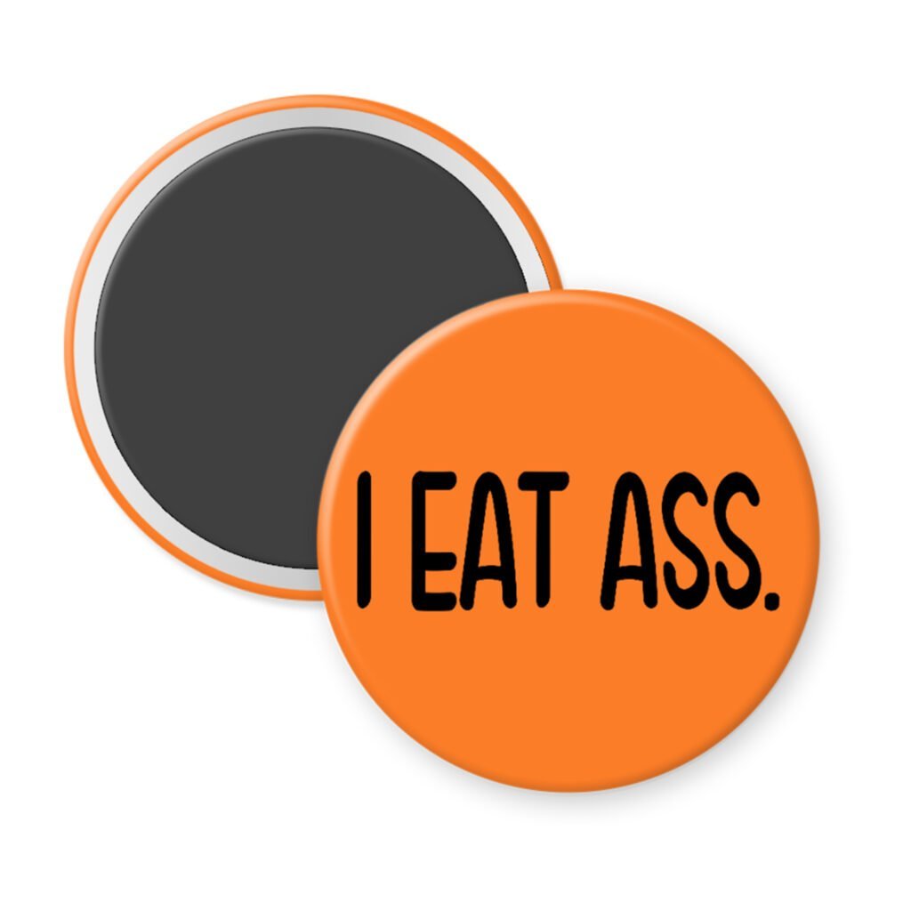 Orange magnet with the text 'I eat ass.' printed in black.