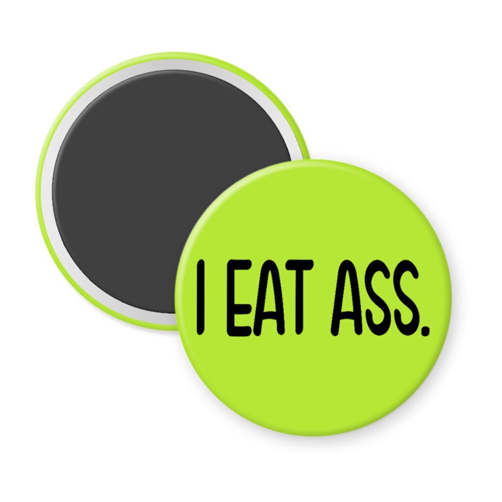 Green magnet with the text 'I eat ass.' printed in black.