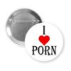 White pinback button with the text 'I ❤️ PORN' printed in black with red heart.