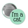 Green pinback button with the text 'I'm a cat.' printed in black.