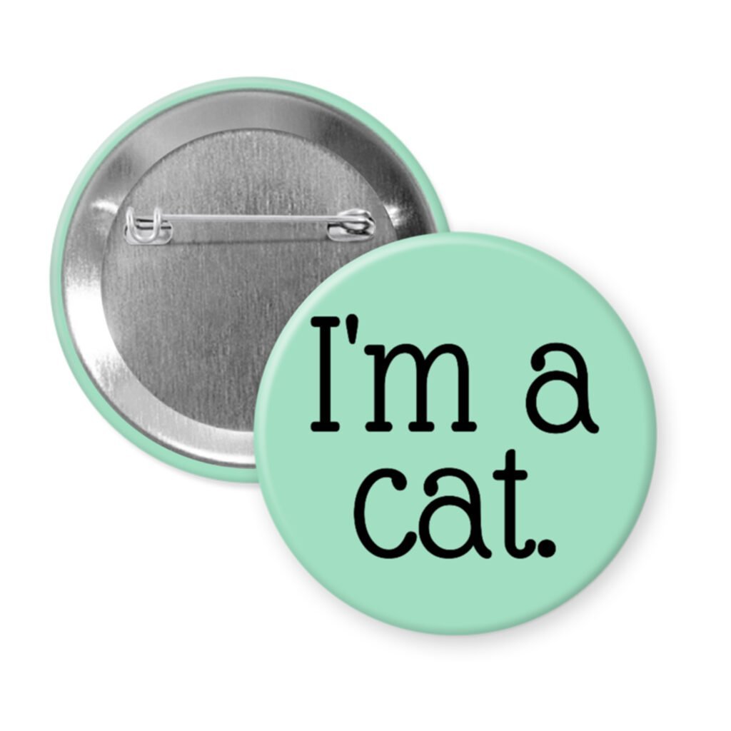 Green pinback button with the text 'I'm a cat.' printed in black.