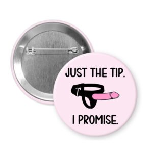 Button badge with 'Just the tip. I promise.' text and ring illustration on a pink background