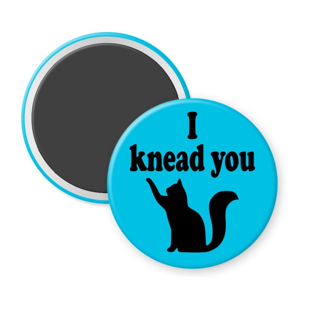 Blue magnet with silhouette of a cat and the text 'I knead you.'