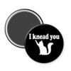 Magnet with 'I knead you' text and cat illustration on a black background