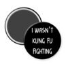 Magnet with 'I wasn't kung fu fighting' text on a black background