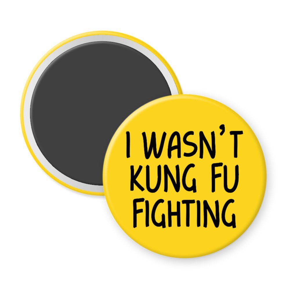 Yellow magnet with the text 'I wasn't kung fu fighting' printed in black.