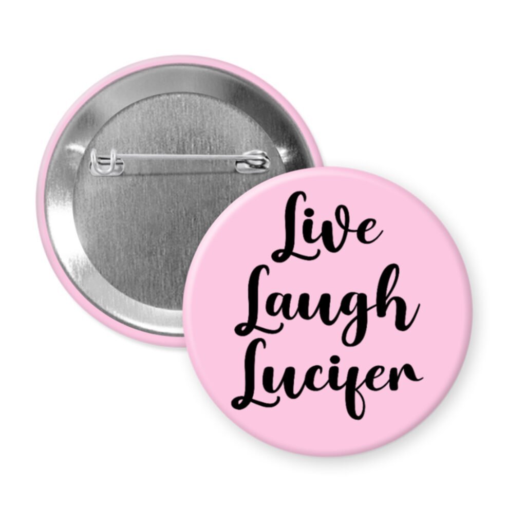 Pink pinback button with the text 'Live Laugh Lucifer' printed in black.