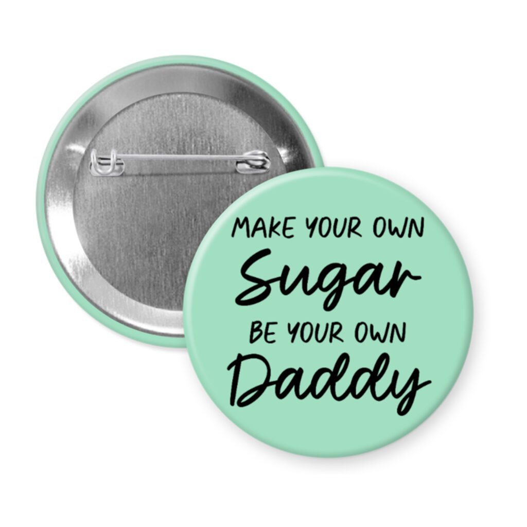 Mint pinback button with the text 'Make your own sugar, be your own Daddy' printed in black.