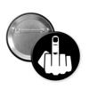 Button badge with a middle finger symbol on a black background