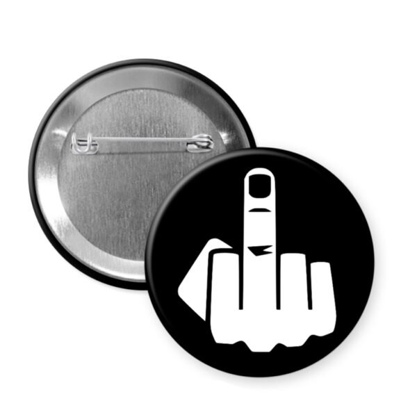 Button badge with a middle finger symbol on a black background