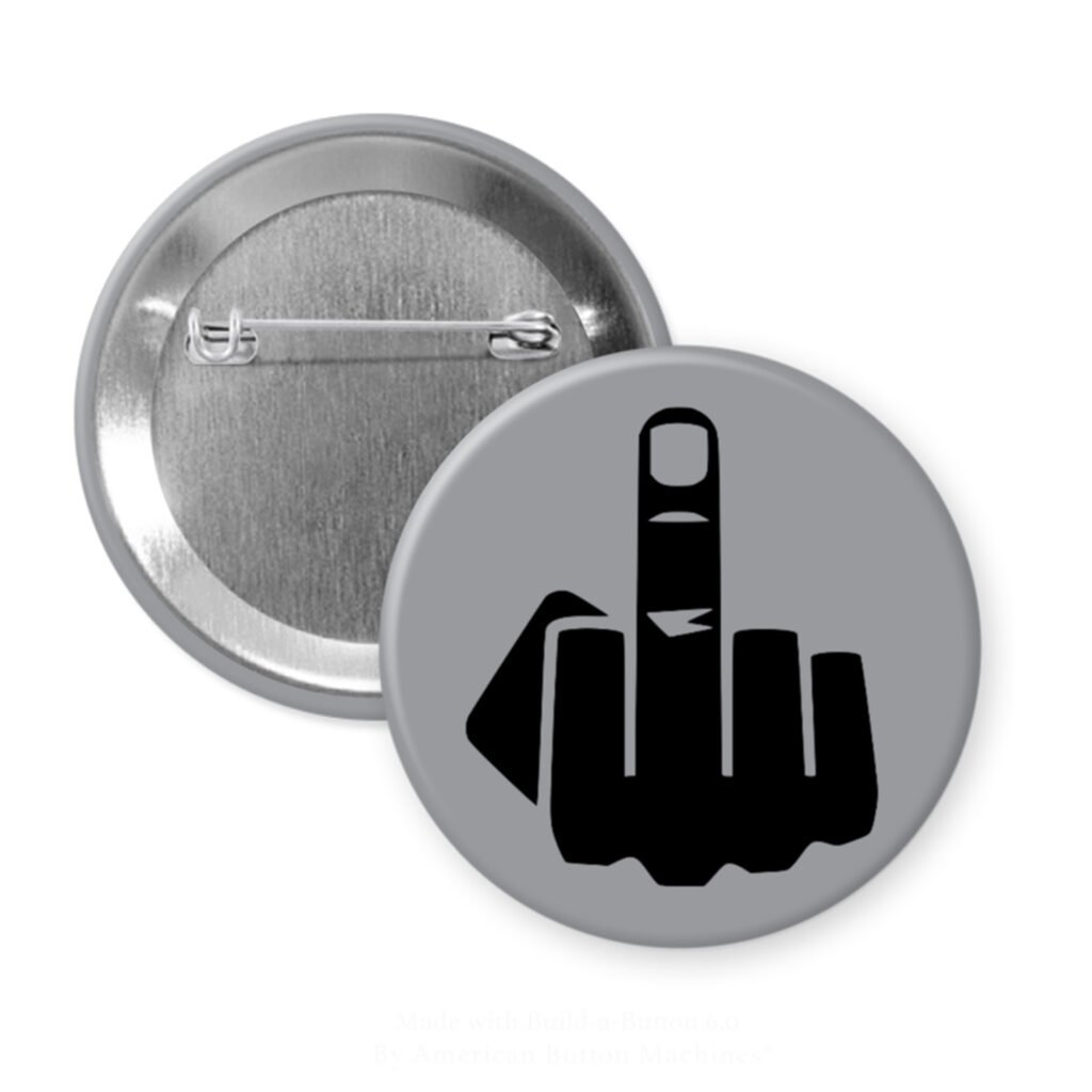 Grey pinback button with silhouette of middle finger printed in black.